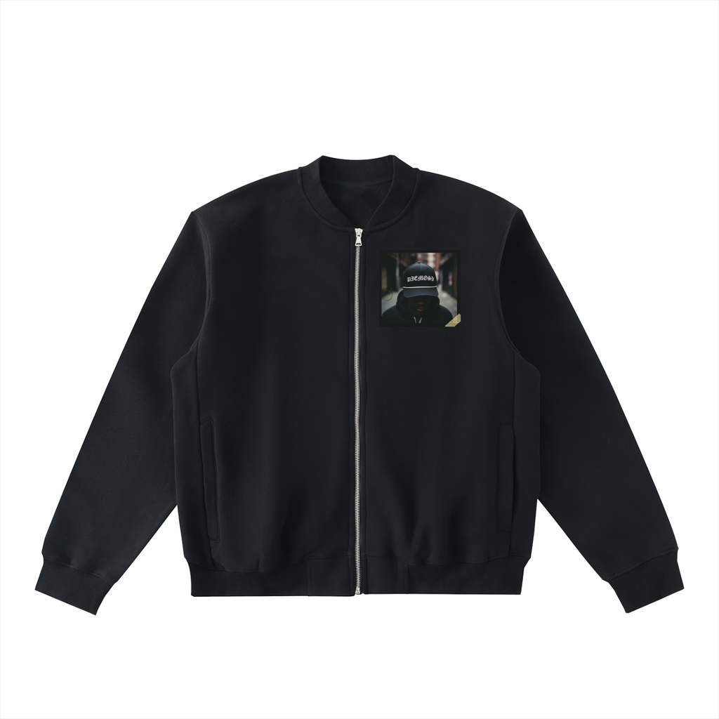 Black jacket with a graphic on the chest against a white background